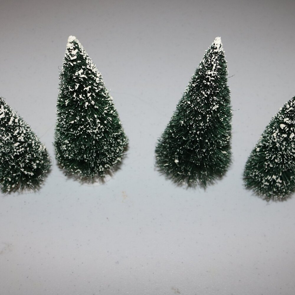 Lot of 4 flocked Dept. 56 Christmas trees for a village 6 and 7 inches tall